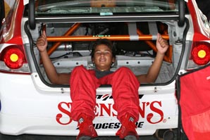 Sandy finds himself a resting space in his race car...