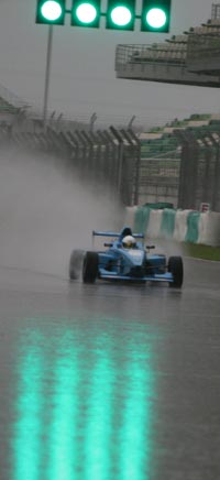 Sandy Nicholas Stuvik racing through the rain at Sepang F1 Circuit August 2009