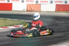 Khun Tisanu exiting the final corner for the La Conca straight-away