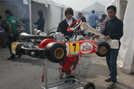 Sandy and San preping the kart